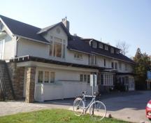Of note is the stone and stucco exterior.; Martha Fallis, 2008.