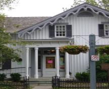 Of note is the wood door with sidelights and transom.; Kirsten Pries, 2008