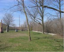 Of note are the mature trees in the park-like setting.; Town of Milton, ND.