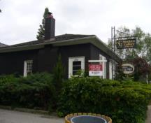 Of note is the chimney on the low hip roof.; Kirsten Pries, 2008.