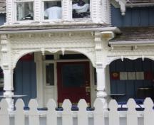 Featured is the offset front entrance with sidelights and transom.; Kirsten Pries, 2008.