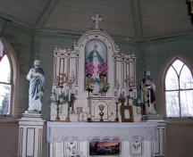 Interior view of the altar in Sts. Peter and Paul Roman Catholic Church, Elphinstone area, 2006; Historic Resources Branch, Manitoba Culture, Heritage and Tourism, 2005