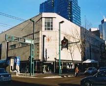 This view of the Hudson's Bay Company Department Store illustrates the prominent block-long Tyndall stone and granite-clad facade facing jasper Avenue, as well as the corner features at 103 Street.; City of Edmonton, 2004