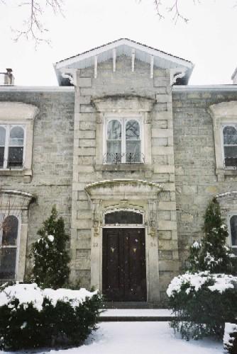 Central projecting 2 storey entrance bay