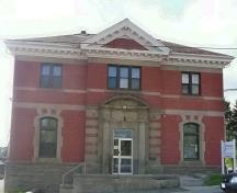 This image shows the well-maintained red brick with local sandstone trim on the front façade.; Village of Hillsborough