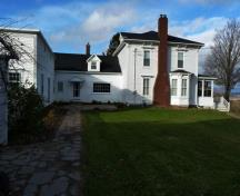 The original cottage built in 1786 is dwarfed by the addition built circa 1840.
The open hearth has been incorporated into the modern kitchen the original cottage has become.; Village of Hillsborough