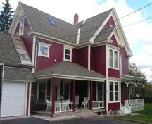 Viewed from Duffy Lane, the detail of the side verandas and bay windows of the house are highlighted.; Village of Hillsborough