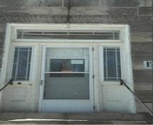 Of note is the entrance with decorative transom and sidelights.; Town of Milton, 2008