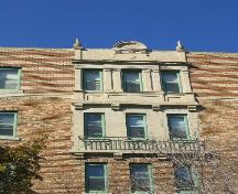 Multi-coloured brick banding on Balfour Apartments, 2004.; Government of Saskatchewan, Lisa Dale-Burnett, 2004.