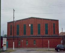 General view of Building A-78, showing the  vertical emphasis along the elevations.; Parks Canada Agency / Agence Parcs Canada.