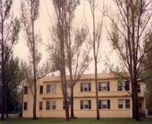 View of Building S-136, showing the horizontally emphasized massing of the building, 1992.; Department of National Defence / Ministère de la Défense nationale, 1992.