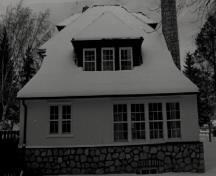 Side view of the Superintendent's Residence, showing the basement walls clad with fieldstone, 1989.; George A. Armstrong, 1989.