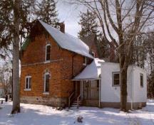 View of the exterior of Former Miller Residence, showing its modest scale and massing, 2005.; Department of Public Works and Government Services / Ministère des Travaux publics et services gouvernementaux, 2005.