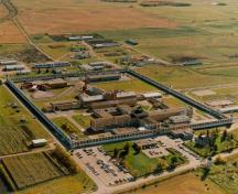 Aerial view of the Prince Albert Penitentiary, showing the Southern Tower D-2 on the far left of the image, 1990.; Correctional Service Canada / Service correctionnel Canada, 1990.