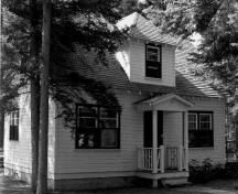 View of the small entrance portico to the Doctor's Residence and Clinic, 1984.; Parks Canada Agency / Agence Parcs Canada, S.Siepman, 1984.