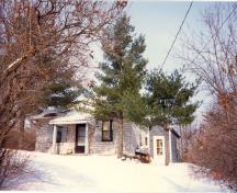 General view of the Defensible Lockmaster’s House, 1987.; Parks Canada Agency / Agence Parcs Canada, 1987.