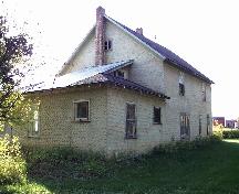 Rear view of the Ronning Homestead Provincial Historic Resource showing the kitchen addition (September 2000); Alberta Culture and Community Spirit, Historic Resources Management Branch, 2000