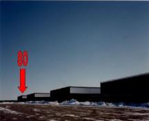 View of Hangar 80, showing its relationship with the four remaining hangars, 2002.; Ministère de la Défense nationale  / Department of National Defence, 2002.