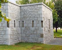Corner view of RMC Building 30a, showing the complex, angular stone walls, 1993.; Parks Canada Agency / Agence Parcs Canada, 1993.