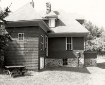 View of the exterior of Limberlost, showing rubble-stone foundation, 1992.; Parks Canada Agency / Agence Parcs Canada / Historica Resources Ltd., 1992.