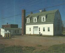 General view of the Cereal Forage Building showing the east (rear) elevation, 2001.; Agriculture and Agri-Business Canada \ Agriculture et Agroalimentaire Canada, 2001.