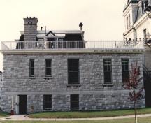 General view of RMC Building 55, showing the varied fenestration, 1993.; Parks Canada Agency / Agence Parcs Canada, 1993.