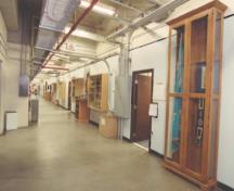 View of a corridor in Hangar 1, showing its interior arrangement, which clearly distinguishes between its two main functions, 2000.; Department of National Defence / ministère de la Défense nationale, 2000.