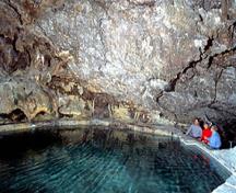 General view of the interior of the cave and Basin pool showing its warm mineral waters, 2002.; Agence Parcs Canada / Parks Canada Agency, K. Dahlin, 2002