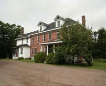 This image shows the brick section of the house built for Sir Albert Smith; Village of Dorchester