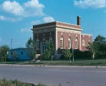 Looking southeast at front and side elevations, 1979.; Government of Saskatchewan, Frank Korvemaker, 1979.