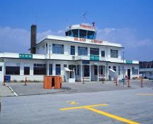 General view of Toronto Island Airport Terminal Building showing its two-storey, rectangular massing.; Parks Canada Agency / Agence Parcs Canada.