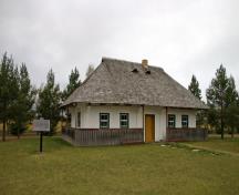 Primary elevations, from the southeast, of Paulencu House, Inglis area, 2006; Historic Resources Branch, Manitoba Culture, Heritage & Tourism, 2006
