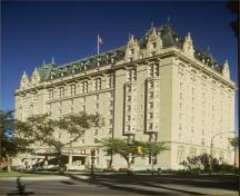General view of Fort Garry Hotel, showing its high-quality materials, including: smooth, Indiana limestone cladding; a grey granite base; and copper roofing, 1985.; Parks Canada/Parcs Canada 1985 (HRS 1026)