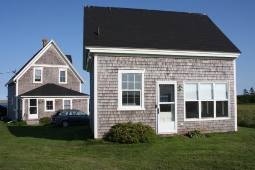 Milk house and side elevation