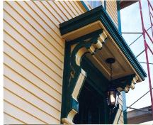 Detailed photo of O'Reilly House decorative brackets and large shelf located over front door.  Photo taken during restoration.; HFNL/ 2006