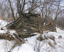 South side of the Doukhobor Dugout House near Blaine Lake in winter, 2006; Government of Saskatchewan, Bernard Flaman, 2006