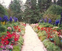 General view of the Long Walk, showing the great variety of horticultural specimens found on the site, 1994.; Parks Canada Agency / Agence Parcs Canada, N. Clerk, 1994.