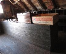 Interior view of merchandise counter at Flour Store, Battle Harbour, NL.; © HFNL 2009