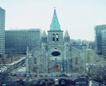 View of the exterior of St. Patrick's Basilica, showing the quality of construction materials, including its limestone masonry, stone decoration and copper roof, 1995.; Parks Canada Agency / Agence Parcs Canada, P. St. Jacques, 1995.