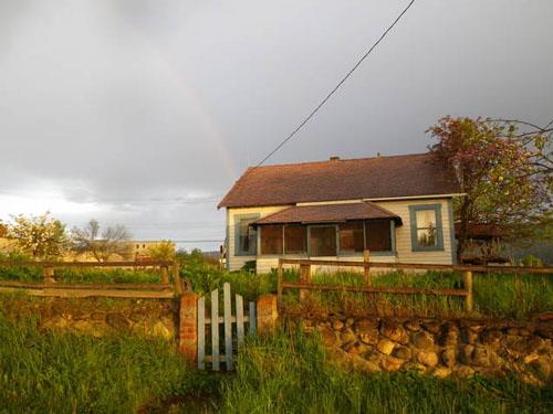 Front view showing house, gate and retaining wall, 2012