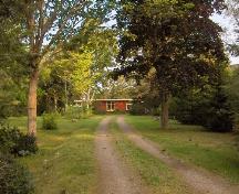 Showing approach to the house in a canopy of trees; City of Charlottetown, Natalie Munn, 2005
