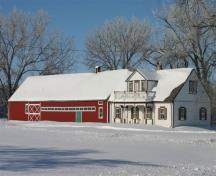 Context view of main elevation from the southeast of the Friesen Interpretive Centre, Neubergthal, 2010; Historic Resources Branch, Manitoba Culture, Heritage and Tourism, 2011