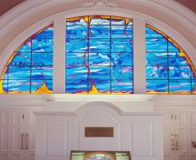 Vue générale de Grand-Pré, qui montre son intérieur ouvert et voûté décoré dans le style néo-Renaissance, 2007.; Parks Canada Agency / Agence Parcs Canada.