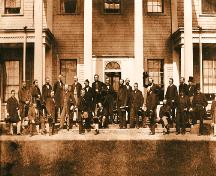 Showing delegates posing with classical columns in the background; G.P. Roberts / National Archives of Canada / C-000733