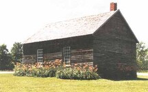 View of the exterior of the Oro African Methodist Episcopal Church, showing its rectangular footprint and single-storey massing under a gable roof, 1999.; Parks Canada Agency / Agence Parcs Canada, Owen Thomas, 1999.
