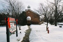 View of the main entrance to the Art Gallery / Former Brougham School House, 2005.; Parks Canada Agency / Agence Parcs Canada, 2005.