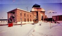 General view of the joining point of the south wing and the dome of Saint-Vincent-de-Paul Penitentiary showing its abundant use of stone materials and their skillful craftsmanship.; Parks Canada Agency / Agence Parcs Canada, n.d.