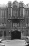 Front view of the Cathcart Armoury, showing the elements of the Tudor Gothic style such as the low ogee arch of the windows and main entrance, 1983.; Canadian Cultural Programmes / Programmes culturels canadiens, 1983.